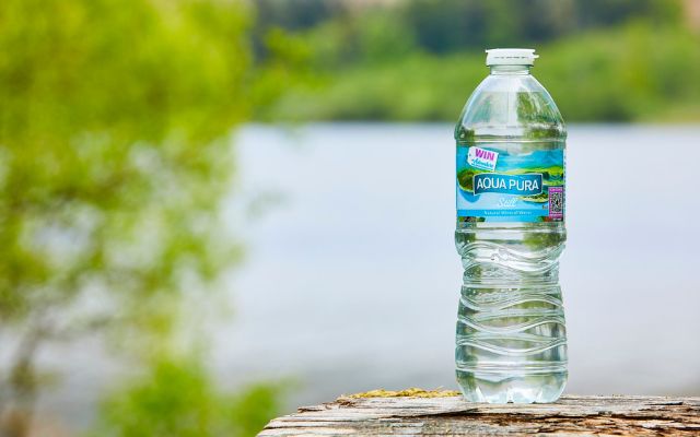 Bottle of water by a lake